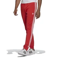 Spodnie sportowe męskie - Spodnie adidas Originals Adicolor Classics Primeblue SST Track HF2134 - czerwone - miniaturka - grafika 1