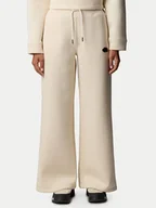 Spodnie sportowe damskie - The North Face Spodnie dresowe NF0A8C25 Beżowy Wide Leg - miniaturka - grafika 1