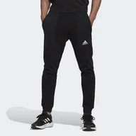 Spodnie sportowe męskie - Spodnie męskie adidas Essentials BrandLove French Terry - miniaturka - grafika 1
