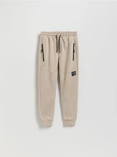 Reserved - Bawełniane spodnie z kieszeniami - beżowy - Spodnie i spodenki dla chłopców - miniaturka - grafika 1