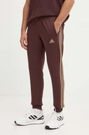 Spodnie męskie - adidas spodnie dresowe Essentials kolor bordowy wzorzyste JG5953 - miniaturka - grafika 1