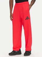 Spodnie sportowe męskie - adidas Spodnie dresowe Essentials JF3601 Czerwony Loose Fit - miniaturka - grafika 1