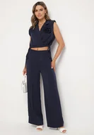 Komplety damskie - Granatowy Komplet Kopertowa Bluzka z Kwiatową Broszką i Szerokie Spodnie Reavilia - miniaturka - grafika 1