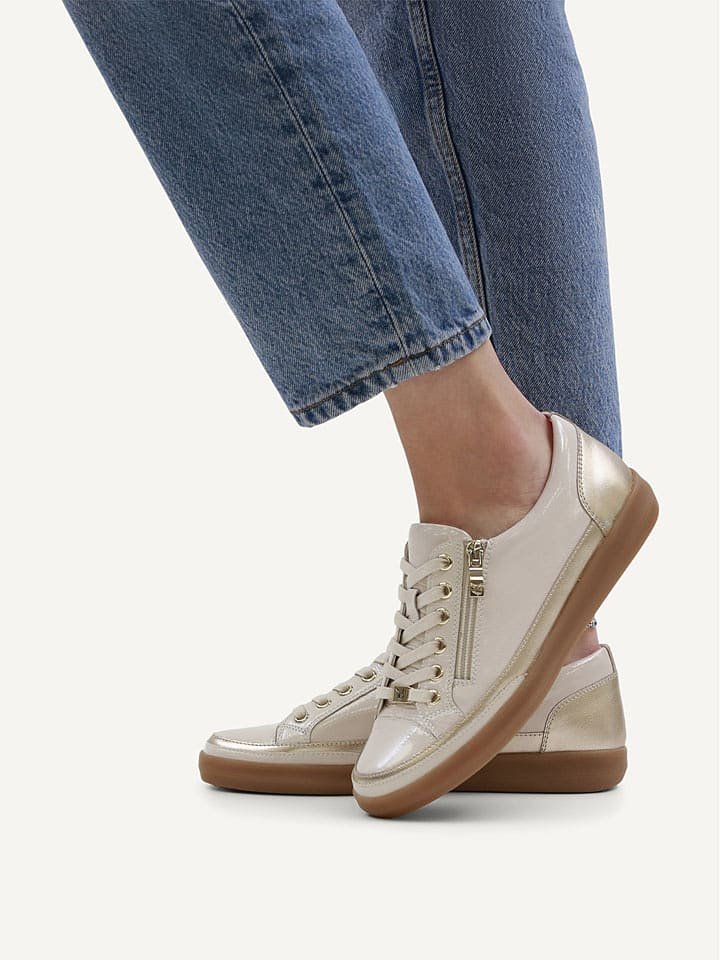 Caprice Skórzane sneakersy w kolorze kremowym