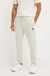 adidas spodnie dresowe Essentials kolor beżowy gładkie JH1039 - Spodnie męskie - miniaturka - grafika 1