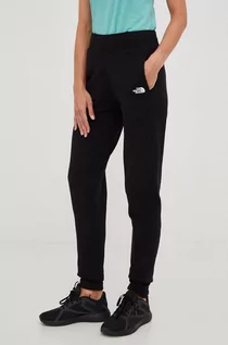 Spodnie damskie - The North Face spodnie dresowe bawełniane damskie kolor czarny gładkie - grafika 1