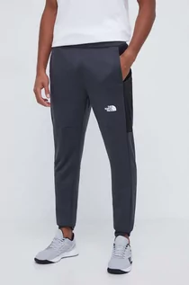 Spodnie męskie - The North Face spodnie dresowe Mountain Athletics kolor szary gładkie - grafika 1