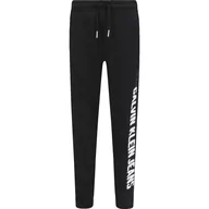 Spodnie i spodenki dla chłopców - CALVIN KLEIN JEANS Spodnie dresowe | Relaxed fit - miniaturka - grafika 1
