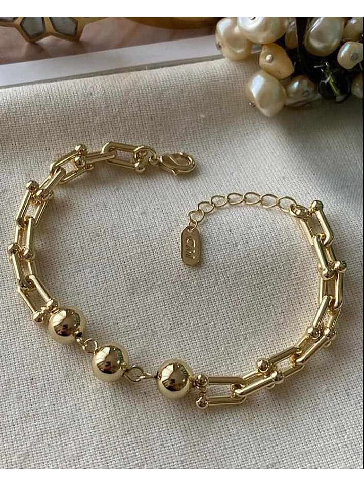 Luseera Pozłacana bransoletka z elementami ozdobnymi