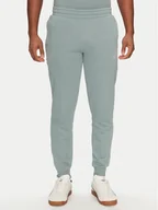 Spodnie sportowe męskie - Puma Spodnie dresowe Ess 684714 Zielony Regular Fit - miniaturka - grafika 1