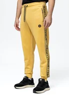 Dresy męskie - Spodnie dresowe PIT BULL OLDSCHOOL TAPE LOGO TERRY żółte (pale yellow)-XXL - miniaturka - grafika 1
