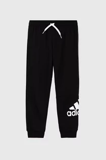 Spodnie damskie - Adidas Spodnie dziecięce kolor czarny z nadrukiem - grafika 1