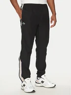 Spodnie sportowe męskie - Lacoste Spodnie dresowe XH8974 Czarny Relaxed Fit - miniaturka - grafika 1