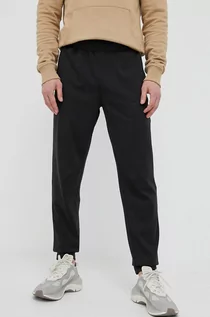 Spodnie męskie - The North Face spodnie dresowe kolor czarny gładkie - grafika 1
