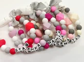 Akcesoria do smoczków - Silikonowa zawieszka do smoczka z imieniem DOWOLNE IMIĘ kolor fuksja - miniaturka - grafika 1