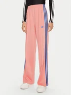 Spodnie sportowe damskie - adidas Spodnie dresowe adicolor Classic Firebird JP2312 Różowy Loose Fit - miniaturka - grafika 1