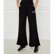 Dresy damskie - EA7 Spodnie dresowe flare fit - miniaturka - grafika 1