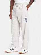 Spodnie sportowe męskie - adidas Spodnie dresowe Collegiate JM9177 Beżowy Regular Fit - miniaturka - grafika 1