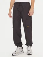Spodnie sportowe męskie - Champion Spodnie dresowe 220415 Czarny Loose Fit - miniaturka - grafika 1