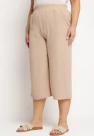 Spodnie damskie - Ciemnobeżowe Szerokie Spodnie z Wysokim Stanem z Gumką w Talii i Nogawkami Długości 3/4 Levolia - miniaturka - grafika 1