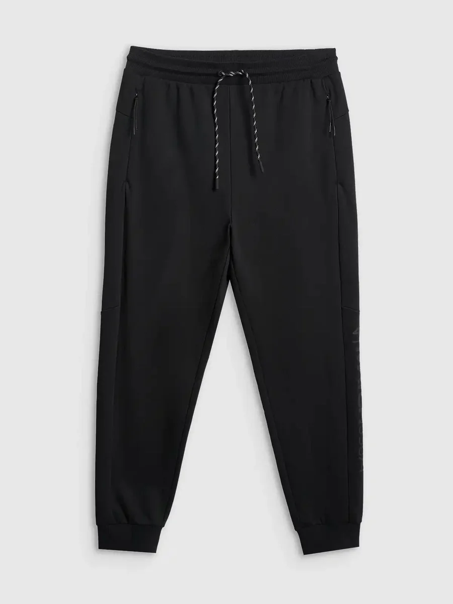 Spodnie dresowe joggery z nadrukiem męskie czarne 4F Czarny 3XL