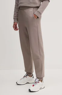 Calvin Klein spodnie dresowe kolor beżowy gładkie K20K208330 - Spodnie damskie - miniaturka - grafika 1