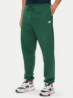 Spodnie sportowe męskie - New Balance Spodnie dresowe Essentials MP41519NWG Zielony Relaxed Fit - miniaturka - grafika 1