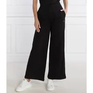 Dresy damskie - CALVIN KLEIN JEANS Spodnie dresowe | Relaxed fit - miniaturka - grafika 1