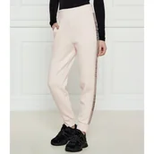 Dresy damskie - GUESS Spodnie dresowe VICTOIRE | Regular Fit - miniaturka - grafika 1