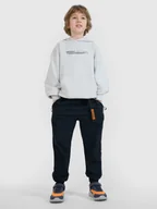 Spodnie i spodenki dla chłopców - 4F Spodnie casual joggery chłopięce - czarne 122 (6-7 lat) - miniaturka - grafika 1