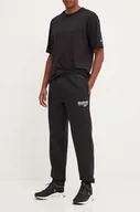 Spodnie męskie - Reebok spodnie dresowe kolor czarny z nadrukiem 100076460 - miniaturka - grafika 1