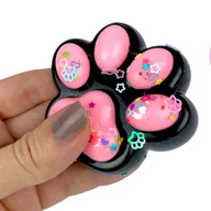 Zabawki sensoryczne - Gniotek łapka Czarna z brokatem Mochi Macaron Flavor - miniaturka - grafika 1