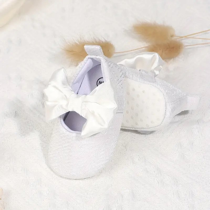 Śliczne buciki dla niemowlaka chrzest kokardka modne buty do chrztu 9 cm
