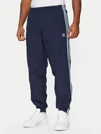 Spodnie sportowe męskie - adidas Spodnie dresowe adicolor Firebird JP1249 Granatowy Regular Fit - miniaturka - grafika 1