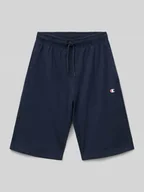 Spodnie i spodenki dla chłopców - Szorty z dzianiny dresowej o kroju regular fit z nadrukiem z logo - miniaturka - grafika 1