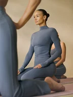 Koszulki sportowe damskie - 4F Longsleeve do jogi slim szybkoschnący damski - niebieski XS - miniaturka - grafika 1