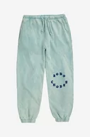 Spodnie i spodenki dla dziewczynek - Bobo Choses spodnie dresowe bawełniane dziecięce kolor niebieski z nadrukiem - miniaturka - grafika 1