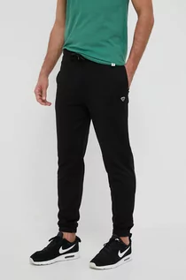 Spodnie męskie - Hummel spodnie dresowe bawełniane kolor czarny z aplikacją - grafika 1