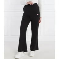 Dresy damskie - Tommy Jeans Spodnie dresowe BADGE WIDE EXT | flare fit - miniaturka - grafika 1