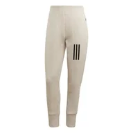 Dresy damskie - Spodnie dresowe damskIe adidas Mission Victory 7/8 beżowe IC0301-XXS - miniaturka - grafika 1