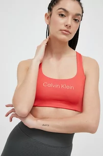 Bielizna sportowa damska - Calvin Klein Performance biustonosz sportowy Essentials kolor pomarańczowy - grafika 1