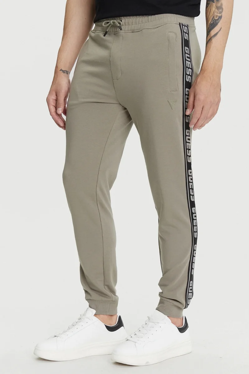 GUESS Zielone męskie spodnie dresowe z lampasami New Arlo XL