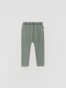 Spodenki dla niemowląt - Reserved - Bawełniane legginsy - ciemnozielony - miniaturka - grafika 1