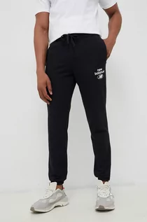 Spodnie męskie - New Balance spodnie dresowe kolor czarny z nadrukiem - grafika 1