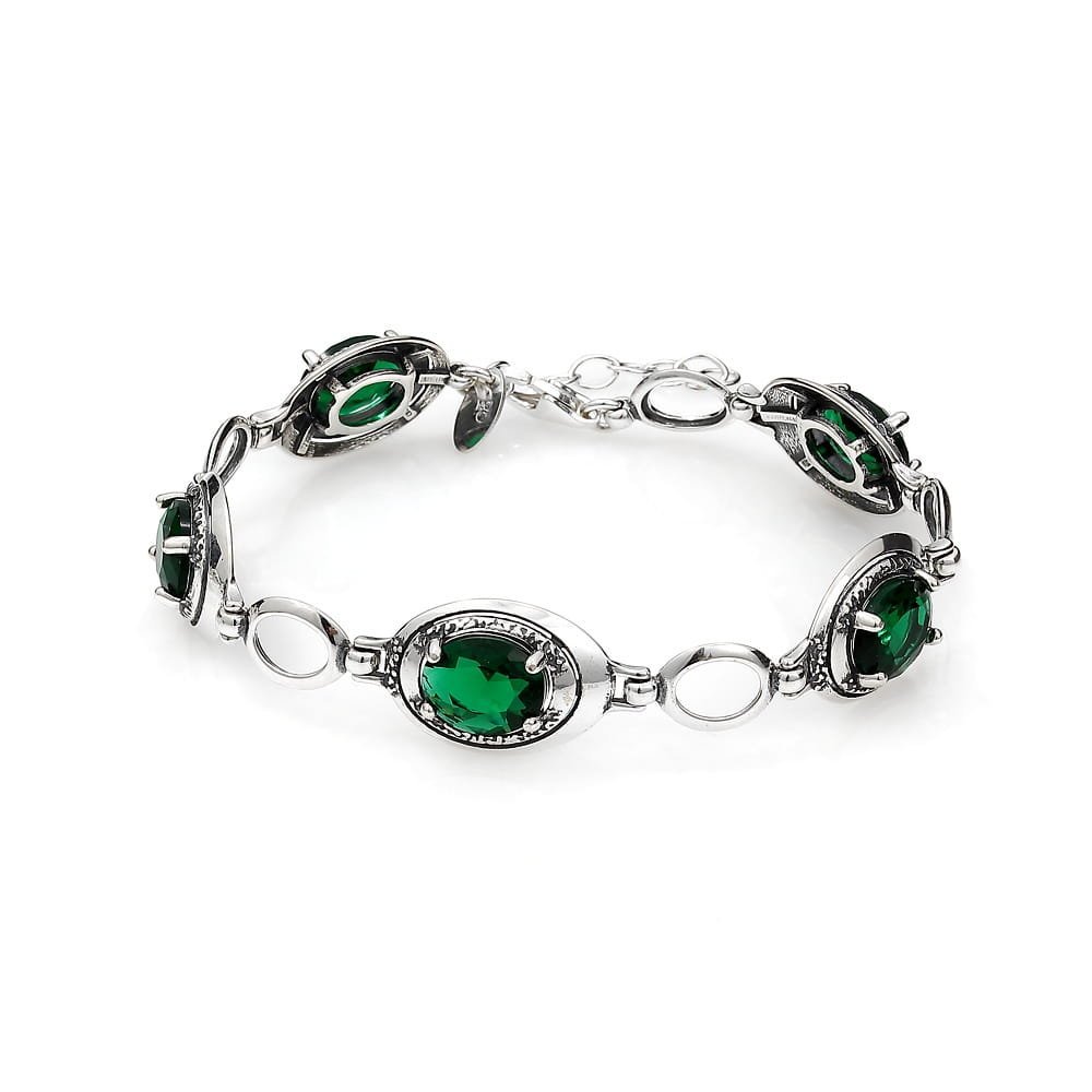 Srebrna bransoletka oksydowana z dużymi błyszczącymi zielonymi cyrkoniami pr925