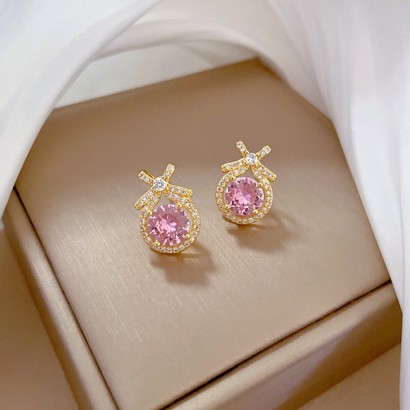 Kolczyki złote z różową cyrkonią kokardka pozłacane