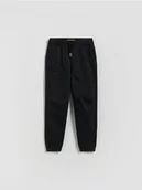 Spodnie i spodenki dla chłopców - Reserved - Wysokoelastyczne spodnie jogger - czarny - miniaturka - grafika 1