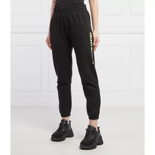 Dresy damskie - DKNY Sport Spodnie dresowe LAYERED | Regular Fit - grafika 1