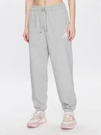 Spodnie sportowe damskie - New Balance Spodnie dresowe WP31530 Szary Relaxed Fit - miniaturka - grafika 1