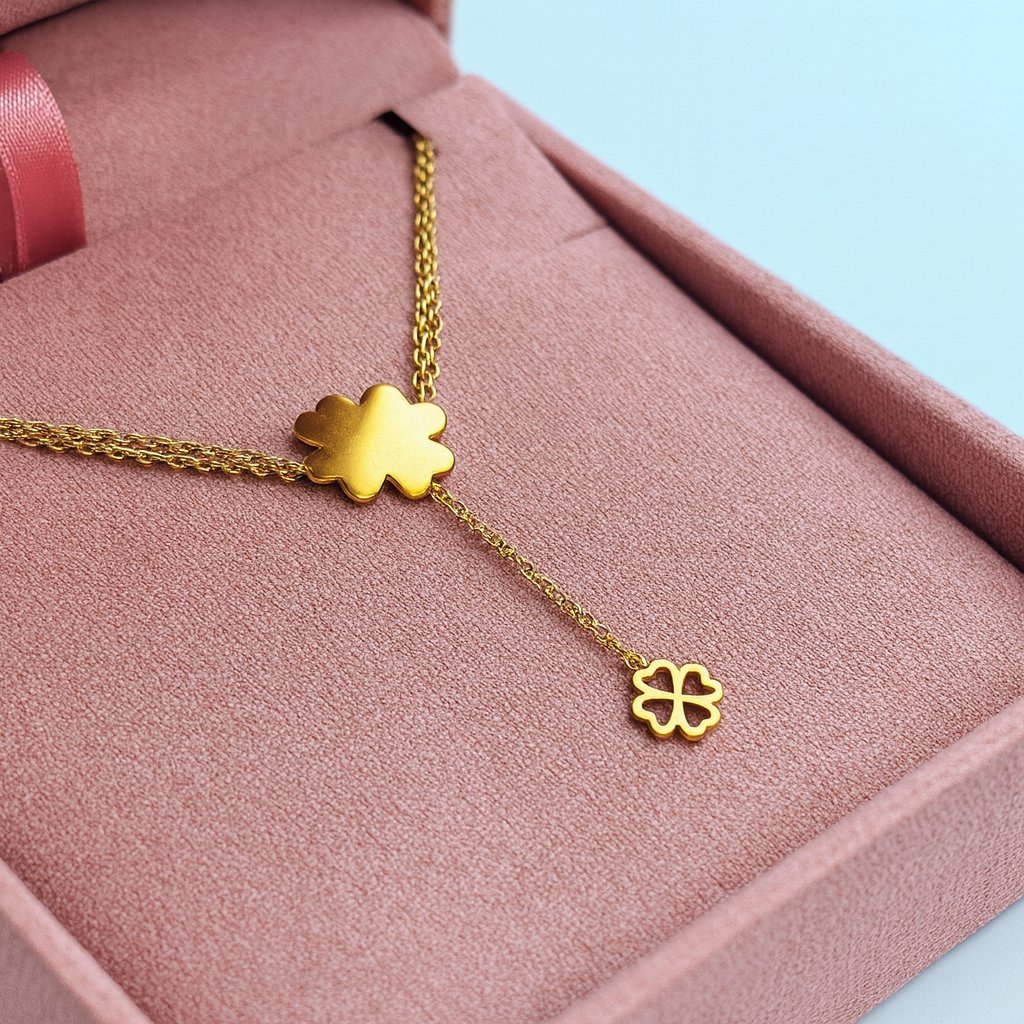 Podwójna złota bransoletka z koniczynkami